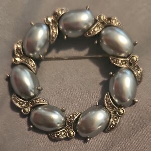 Elegant Silver Brooch with Pearl Accents